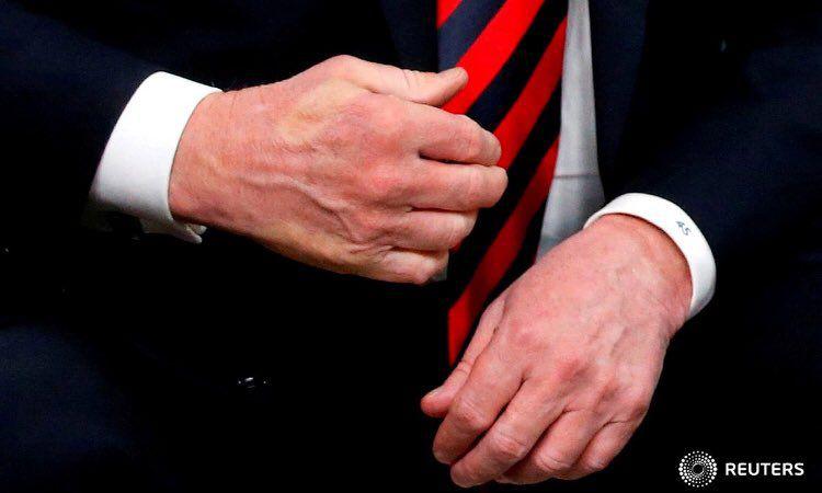 اثر دست دادن عمیق ماکرون با ترامپ (عکس)